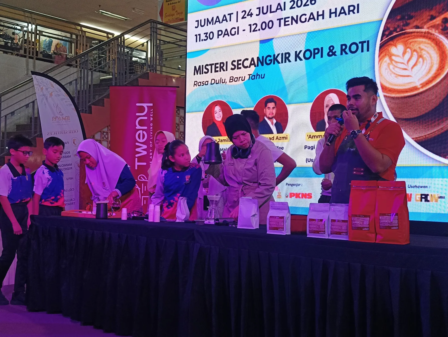 Tweny coffee brewing demonstration at a community event